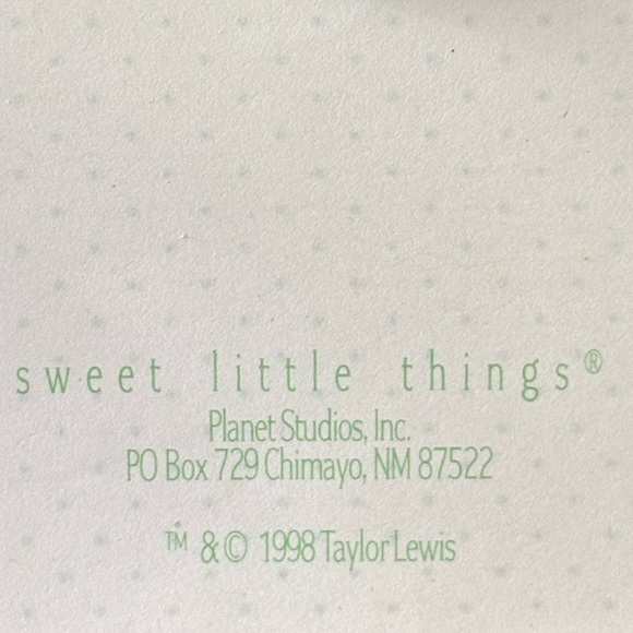 Tiny little bunny pin with pink ears, a blue bow, and white “heart” cottontail - Picture 10 of 12